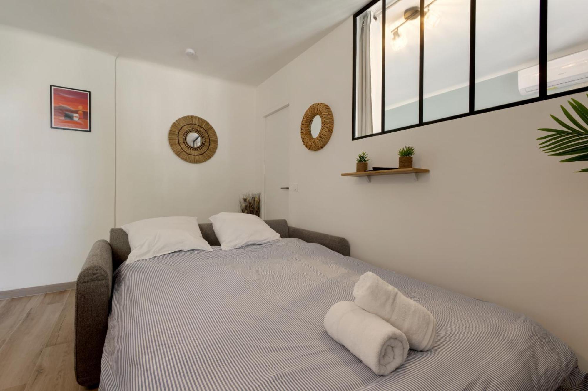 016- T2 Tropisme, 1 Chambre,clim,wifi,parking