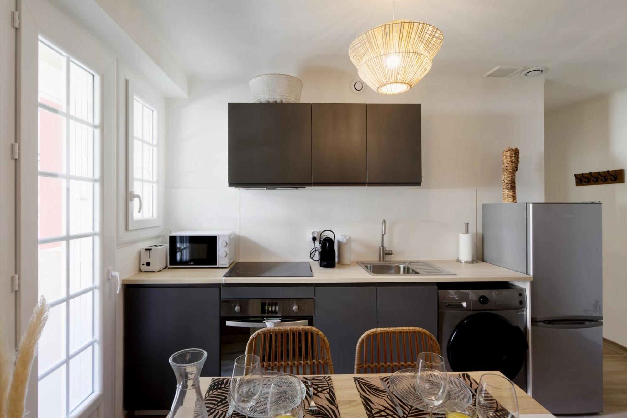 016- T2 Tropisme, 1 Chambre,clim,wifi,parking